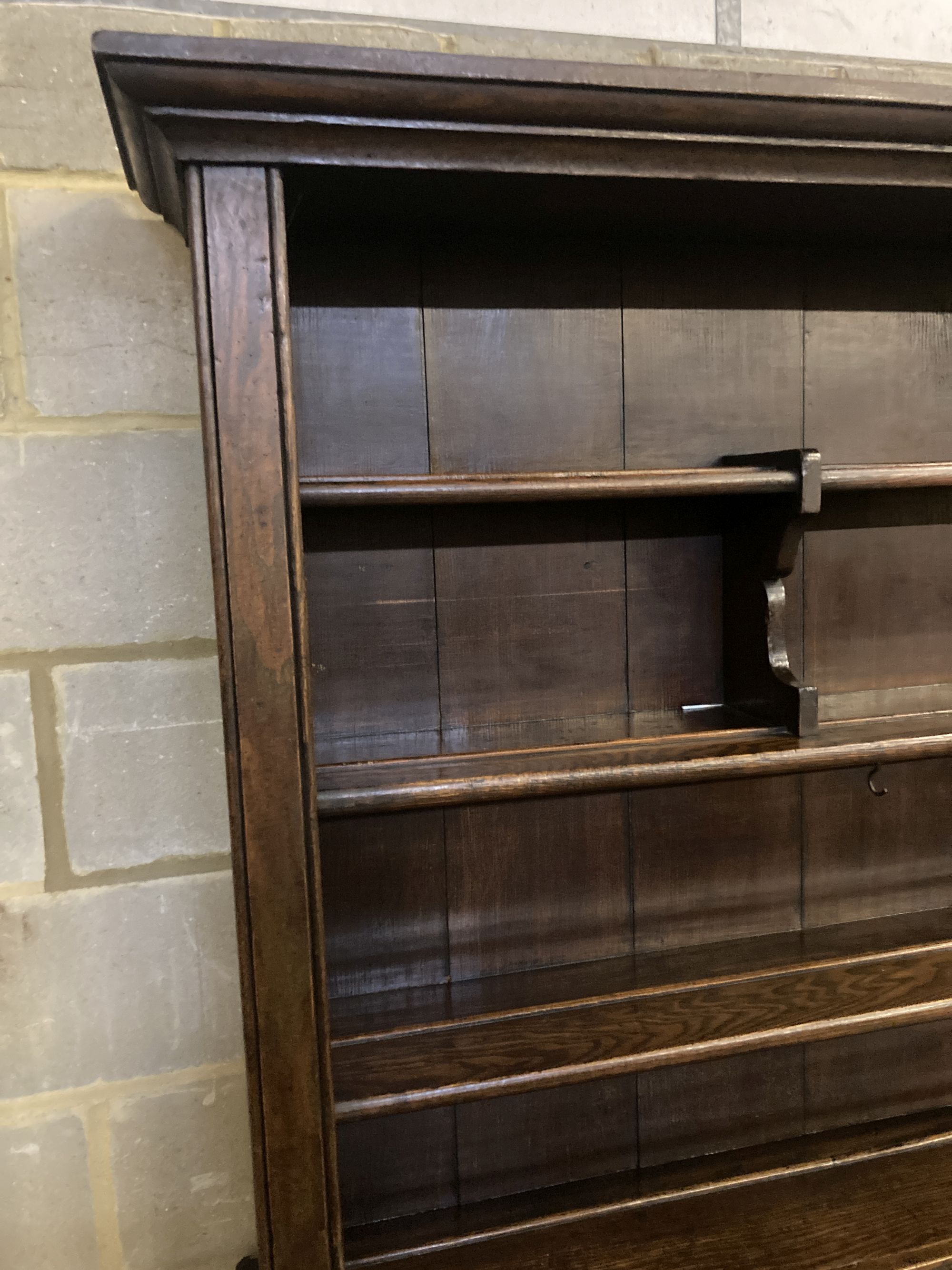 A George III oak and pine dresser, width 188cm depth 50cm height 204cm